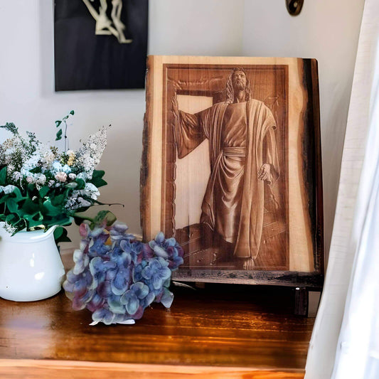 Close-up of 3D Jesus figure emerging from the tomb, crafted in high-detail wood art.