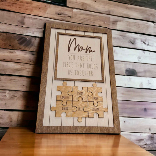 Personalized Mom/Dad Puzzle Sign displayed in a cozy living room, showcasing the love and bond of the family