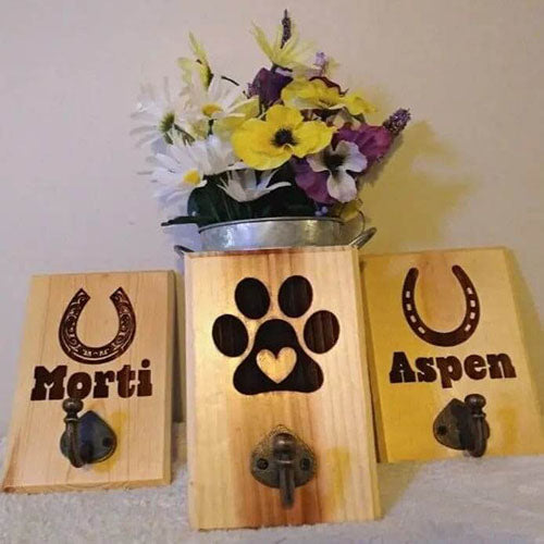 Horse Tack Holder next to flowers in home, 6 inches by 8 inches