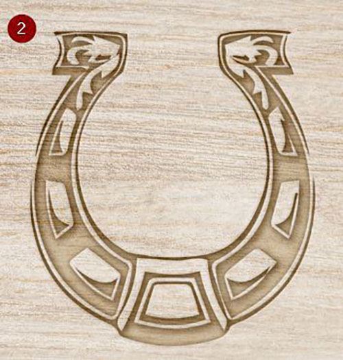 Mock up of wooden horseshoe decoration with a rustic finish on a light wood grain background