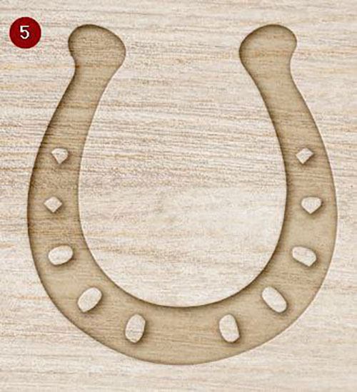 Mock up of wooden horseshoe decoration with a rustic finish on a light wood grain background