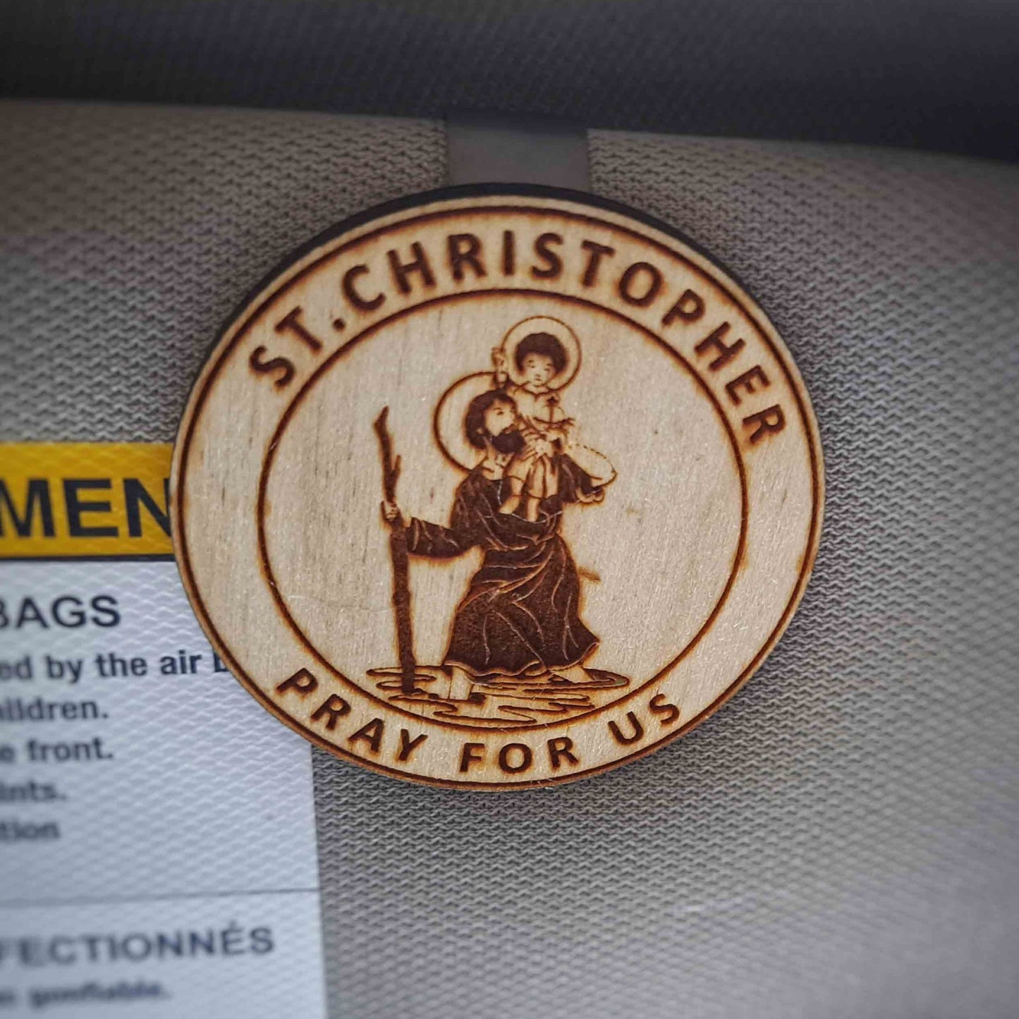 St. Christopher visor clip for divine protection while driving