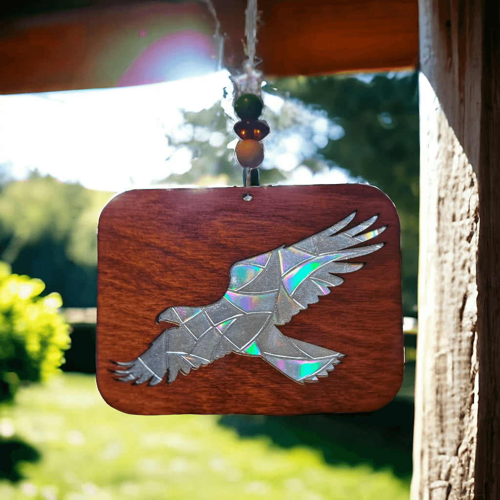 Enchanted Prism Wooden Animal Sun Catcher casting rainbow reflections