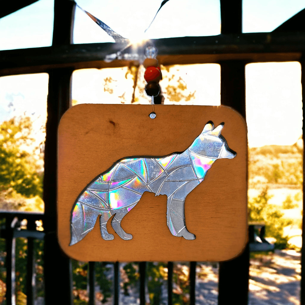 Enchanted Prism Wooden Animal Sun Catcher casting rainbow reflections