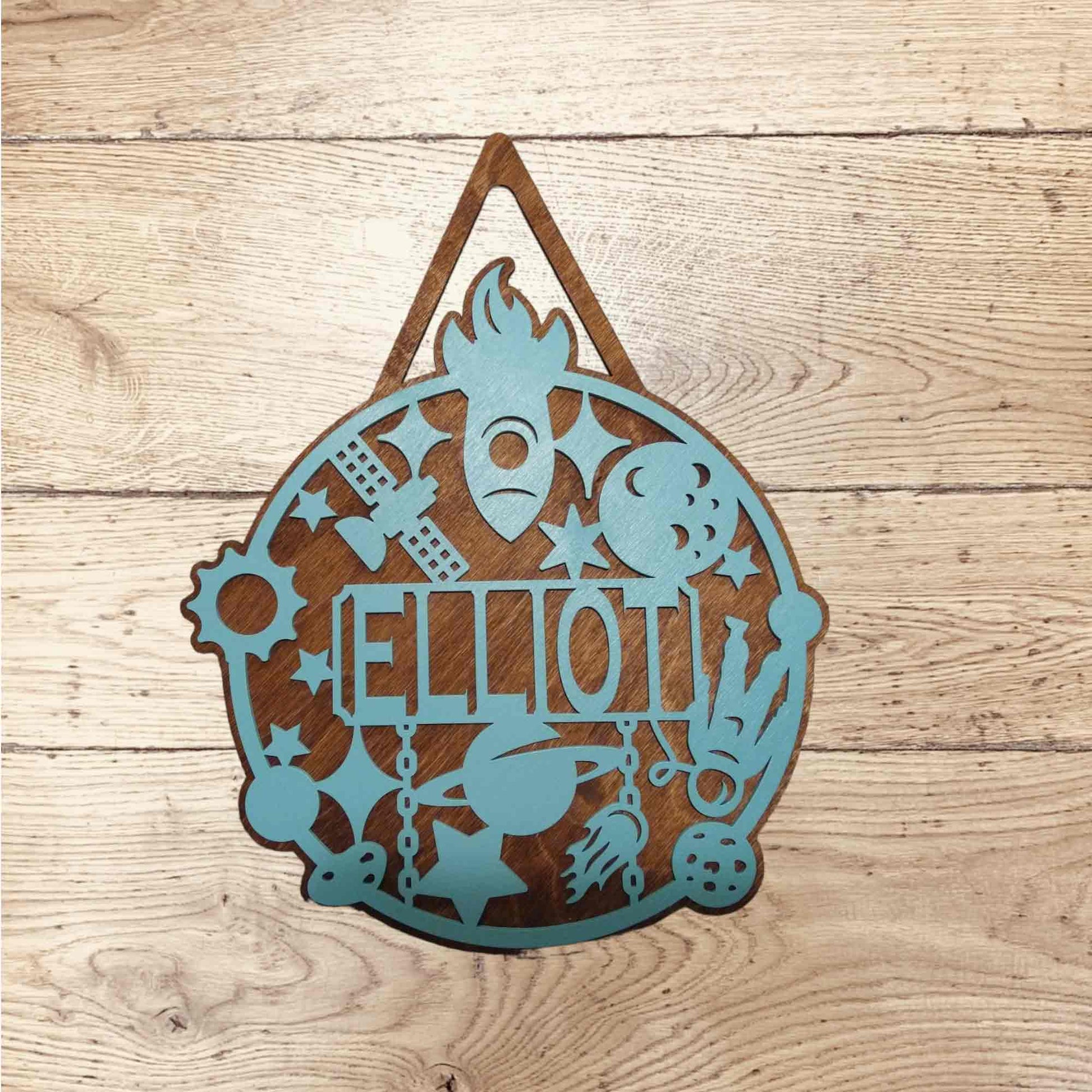 Personalized round nursery door hanger with custom baby name